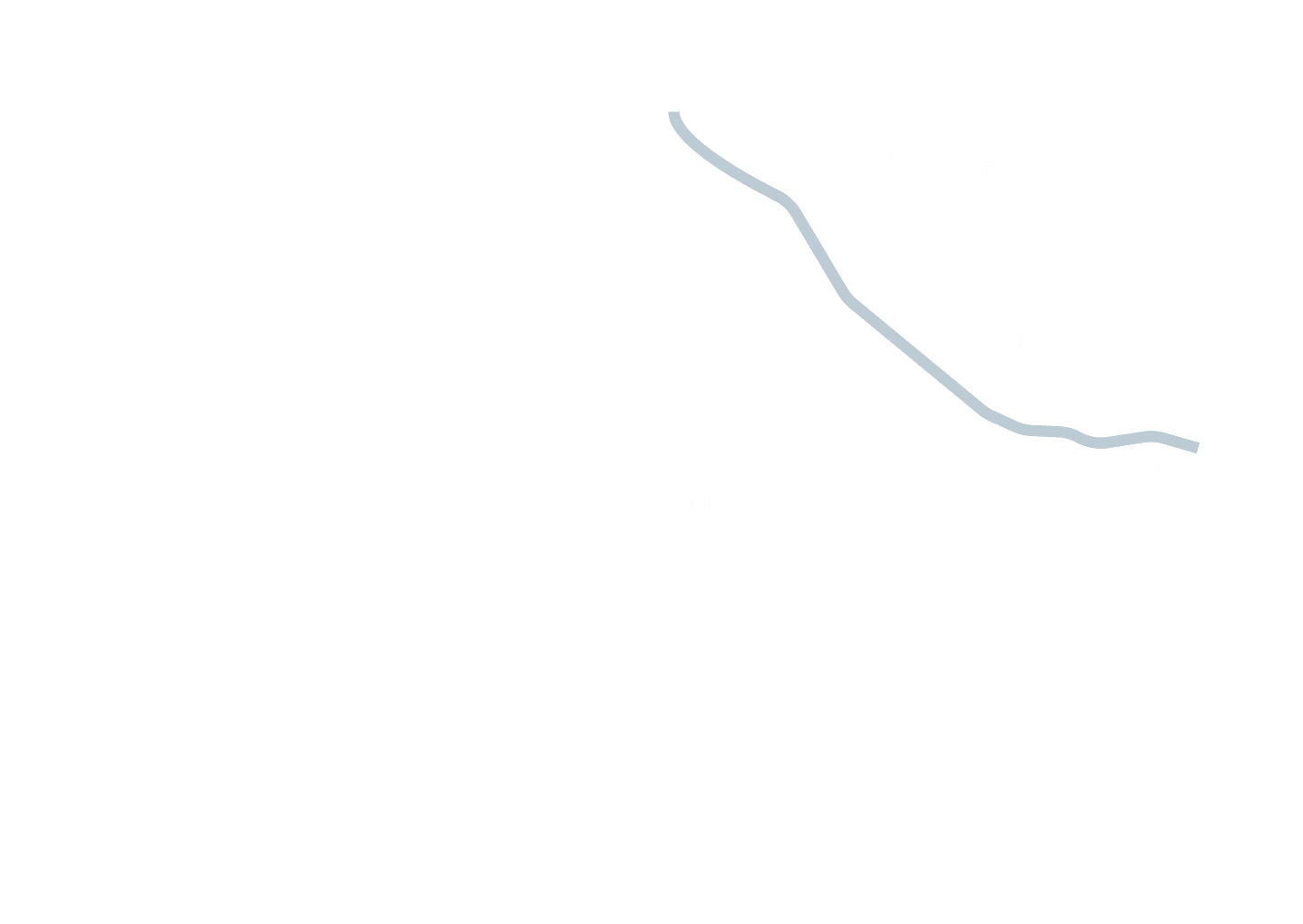 Eine vereinfachte Karte mit schwachen Umrissen von Straßen und Städten, die eine gekrümmte blaue Hauptstraße hervorhebt, die durch eine zentrale, weiß umrandete Region führt, auf der St. Pölten und Baden eingezeichnet sind.